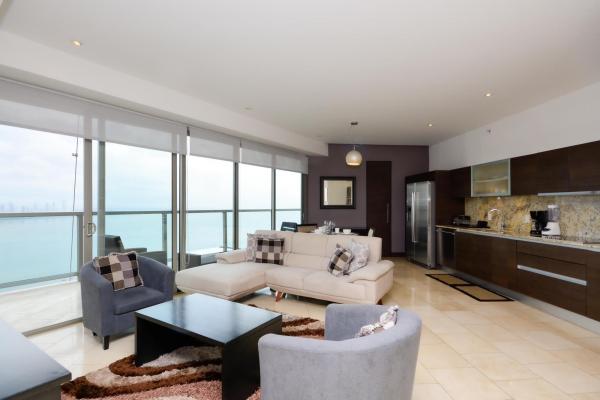 Furnished 2-bedroom + den apartment ocean views