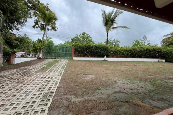 House in playa corona with large land