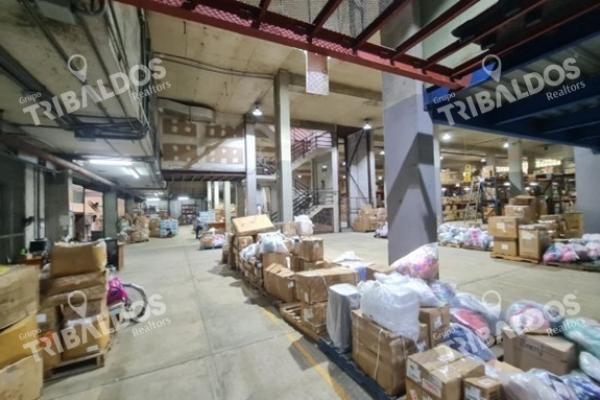 Sale of building with large warehouse and offices in the city.