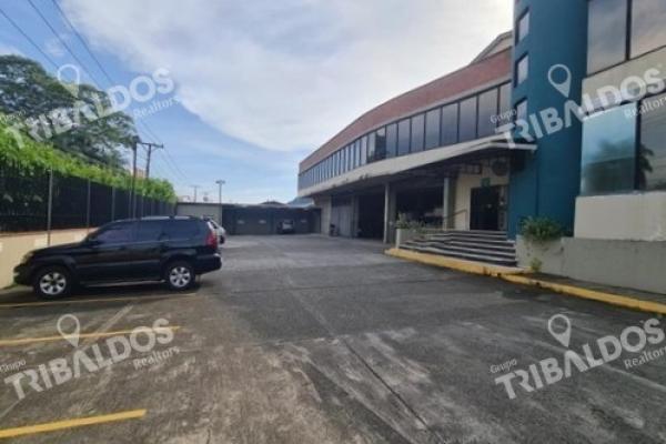 Sale of building with large warehouse and offices in the city.