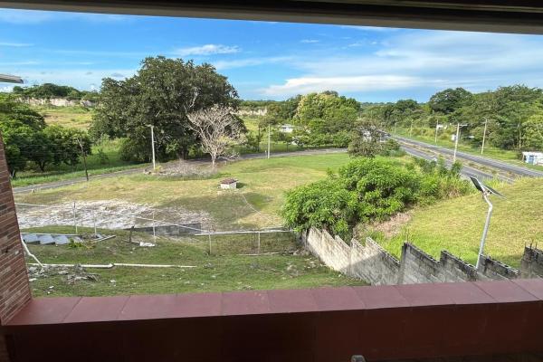 Venta de terreno con mejoras en san carlos, frente a la panamericana