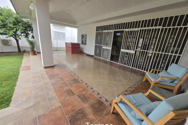 Golf palm trees 525,000 neg near serene beach