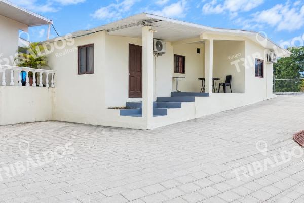 Venta de terreno comercial con mejoras