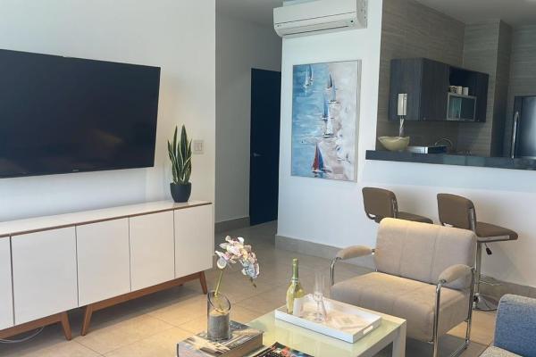 Apartamento moderno de 2 habitaciones frente al mar en playa malibú