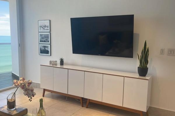 Apartamento moderno de 2 habitaciones frente al mar en playa malibú