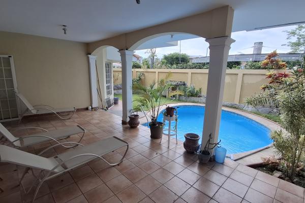 A single-family house with a pool is for sale in altos de panama.