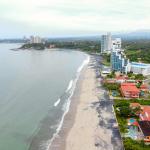 Apartamento moderno de 2 habitaciones frente al mar en playa malibú