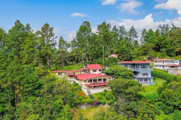 Home plus 2 apartments and casita for sale